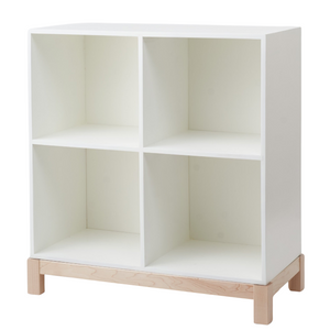 A white wooden handmade Cubby Bookshelf is shown at an angle, facing left. 