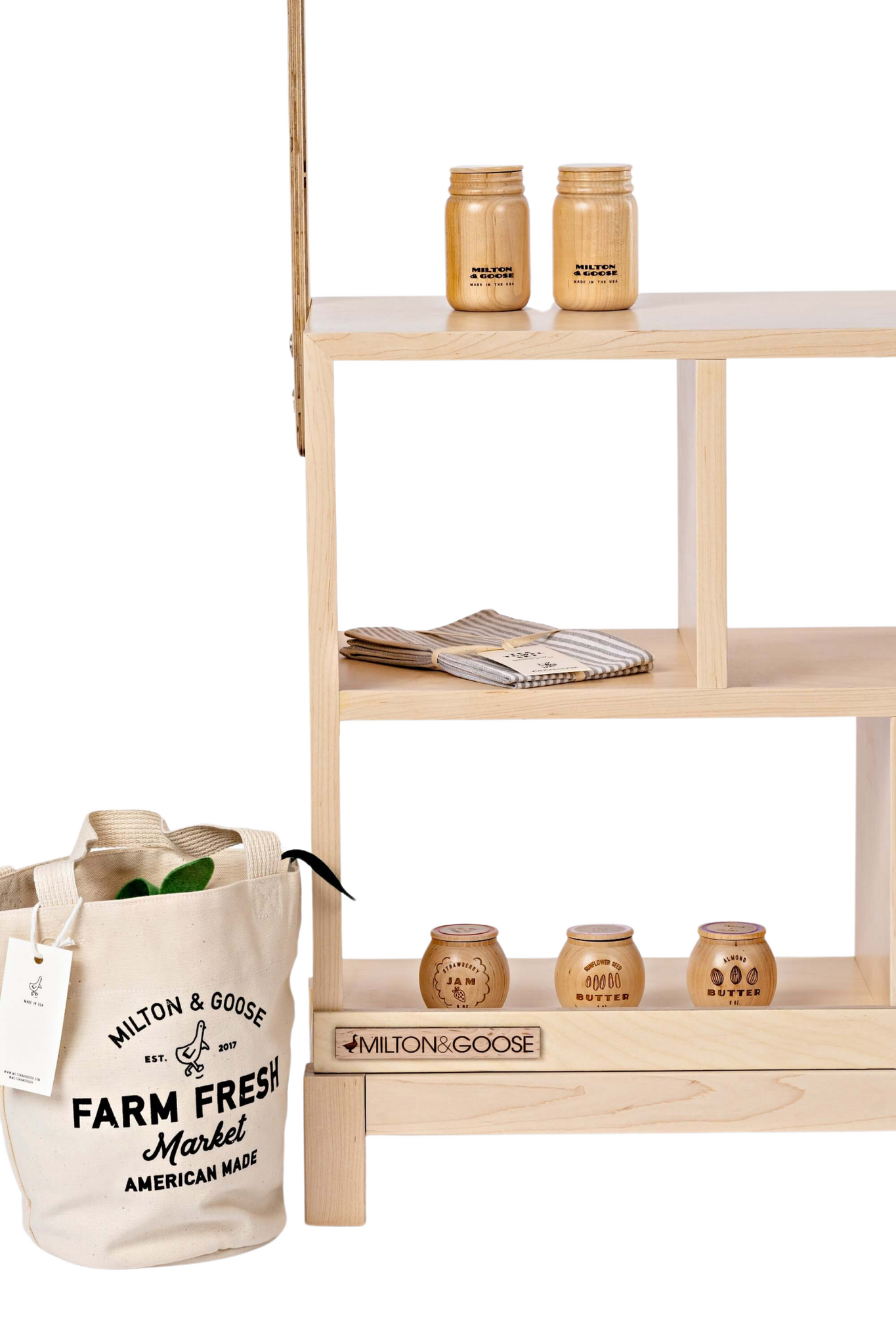 Milton & Goose wooden Market Stand in natural wood tone. Made with Baltic Birch Plywood and North American Maple. Style with Milton & Goose play food and textiles.