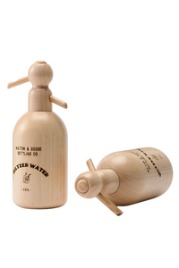 Two wooden Seltzer Bottle Toys. One is standing and one is laying on its side.