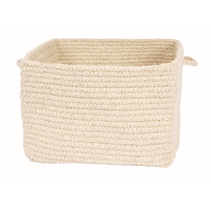 A chunky braided basket made of 100% undyed wool in the color "natural". 