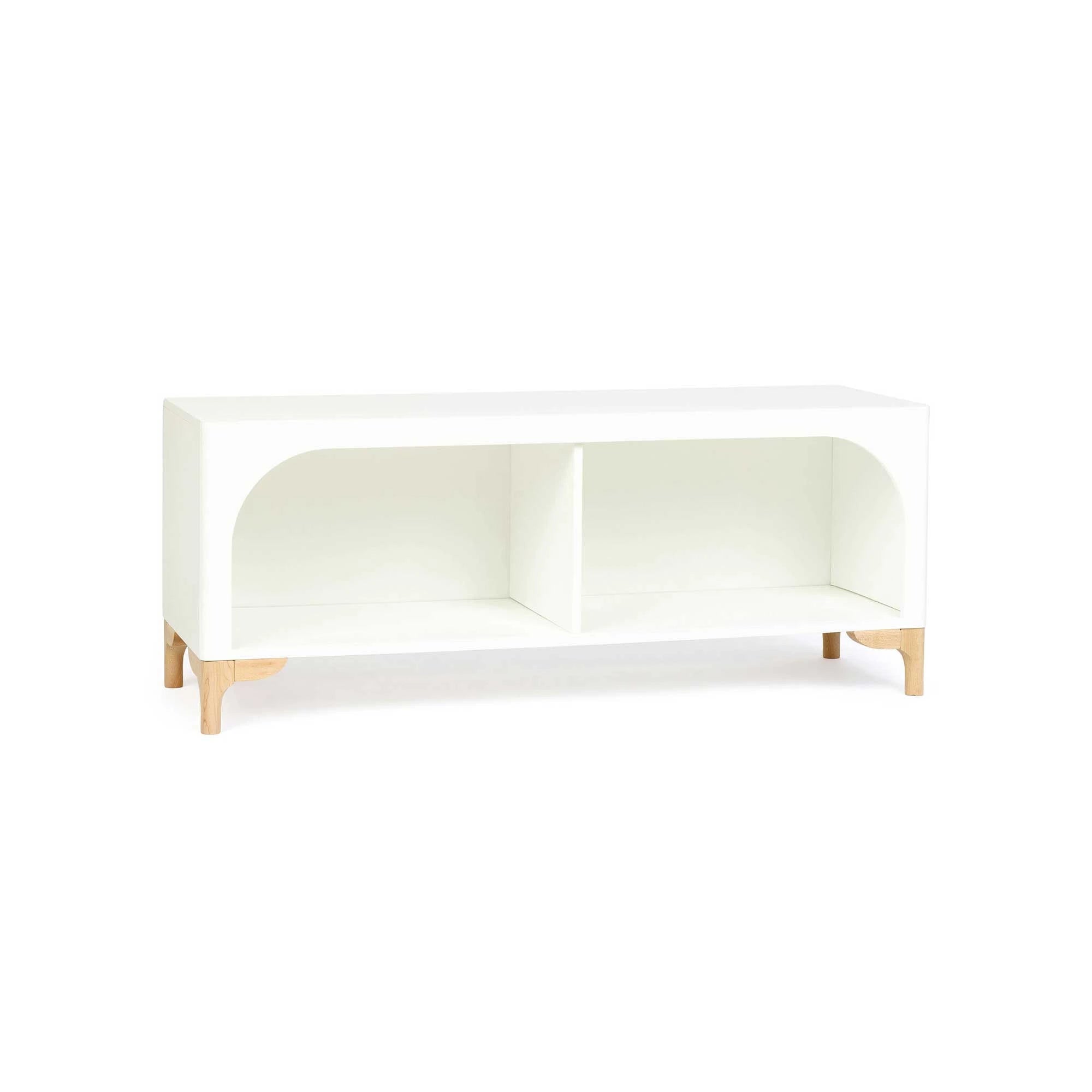 The wooden Archie Bench by Milton & Goose is shown sitting on a slight angle to show the right side and front side of the product. 