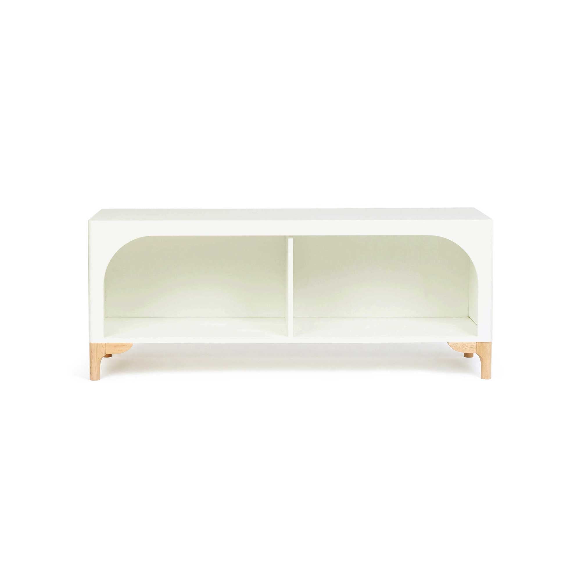 The wooden Archie Bench by Milton & Goose shown in white facing forward so you can see the beautiful arch framing two storage spaces.