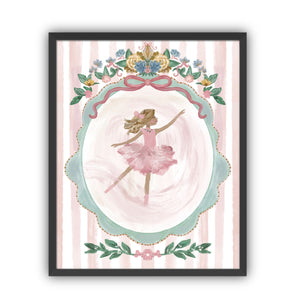 Framed artwork of a ballerina with blond hair in a pink dress with floral decorations on a striped background in a black frame.