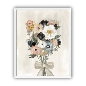Framed floral artwork with a bouquet of flowers and a bow on a beige background in a white frame.