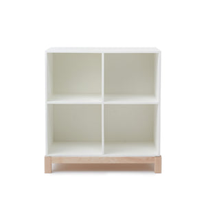 The wooden, handcrafted White Cubby Bookshelf is shown facing forward with four cubby spaces. 
