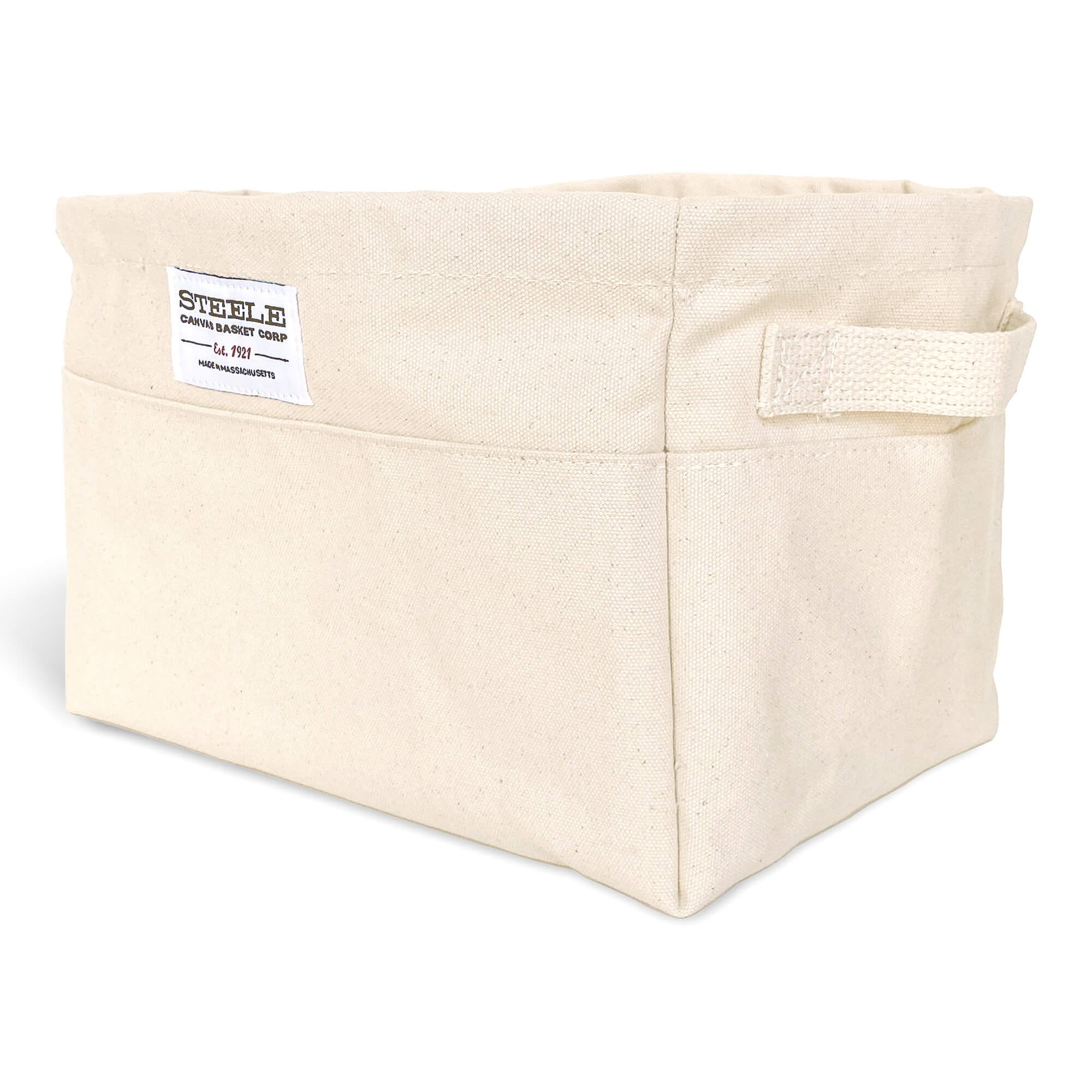 Beige canvas bin with two handles on a white background