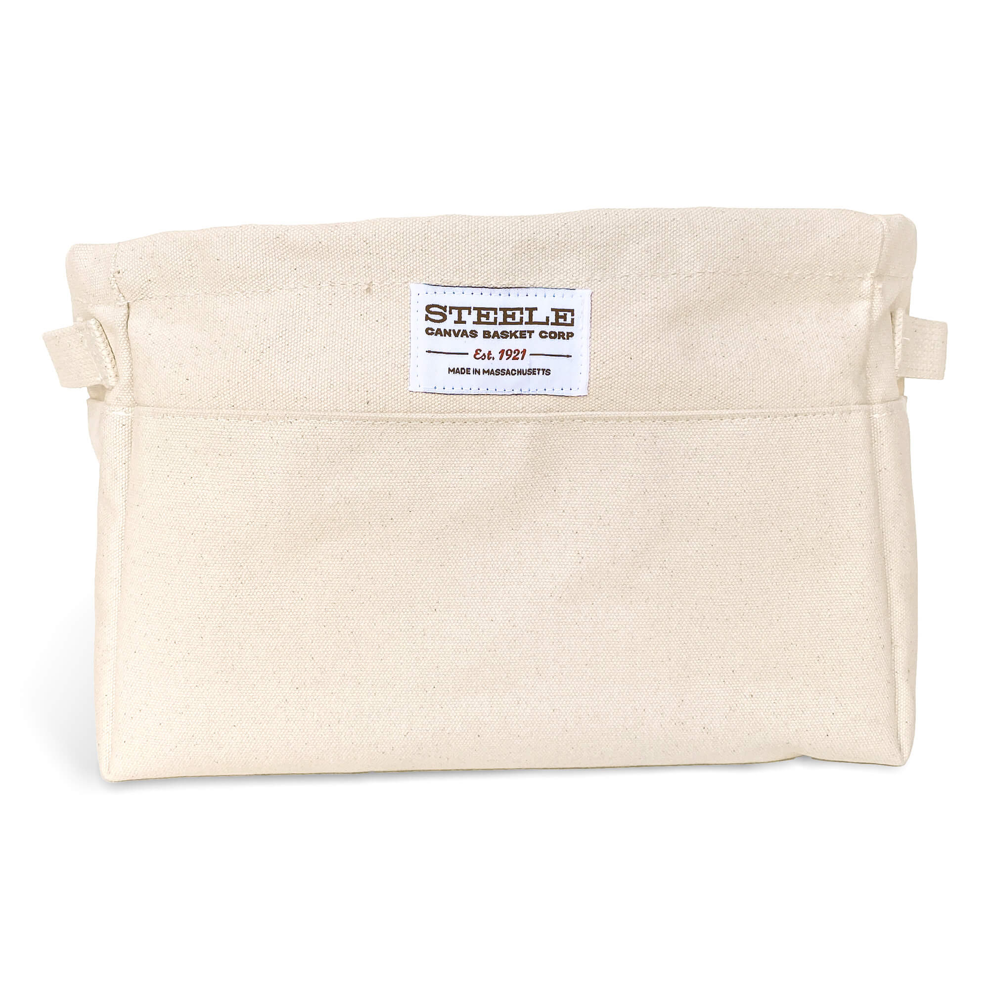 Beige canvas bin with two handles on a white background