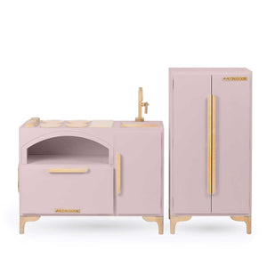 Milton & Goose Luca Play Kitchen collection in dusty rose. This 2-piece collection includes the Play Kitchen with pizza paddle and play refrigerator.