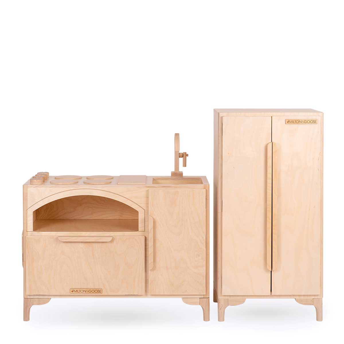 Milton & Goose Luca Play Kitchen collection in natural. This 2-piece collection includes the Play Kitchen with pizza paddle and play refrigerator.