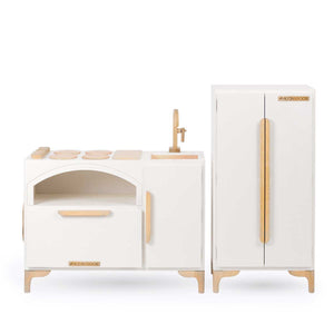 Milton & Goose Luca Play Kitchen collection in white. This 2-piece collection includes the Play Kitchen with pizza paddle and play refrigerator.