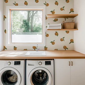 Laundry room with peel and stick wallpaper of oranges