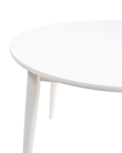 Close up of the Milton & Goose Round Crescent table in white.