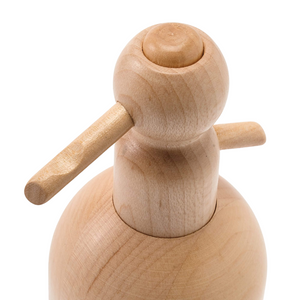 Close up of wooden seltzer bottle toy by Milton & Goose. Image is focused on the top push button and spout.