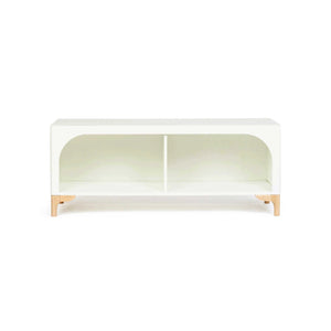 The wooden Archie Bench by Milton & Goose shown in white facing forward so you can see the beautiful arch framing two storage spaces.