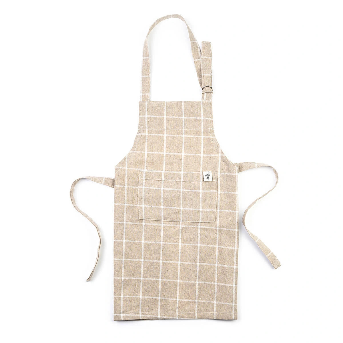 A child's apron in a tan windowpane print.