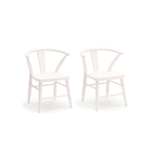 A set of 2 Milton and Goose's kid's crescent wood chairs in white.