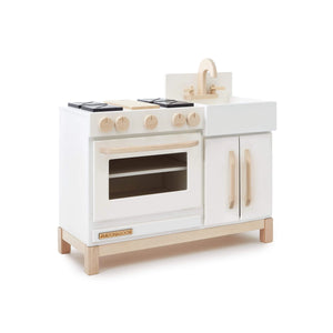 The Essential Play Kitchen in White is shown at an angle, facing right.