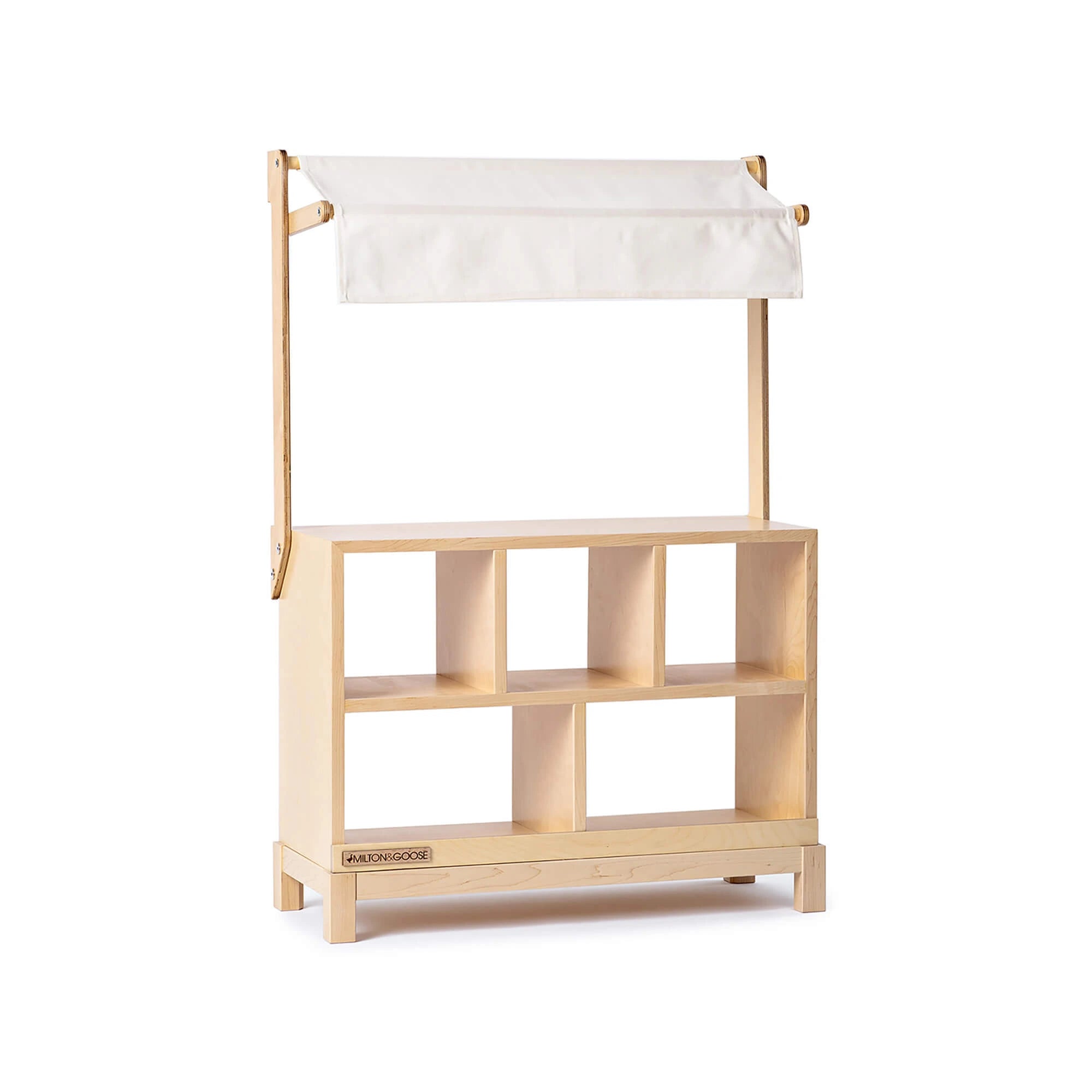 A wooden, sturdy Market Stand in Natural is shown with a white canopy. 