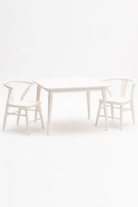 Milton and Goose Crescent Children's table and chairs painted in white.  Made with sustainable materials and non-toxic finishes.