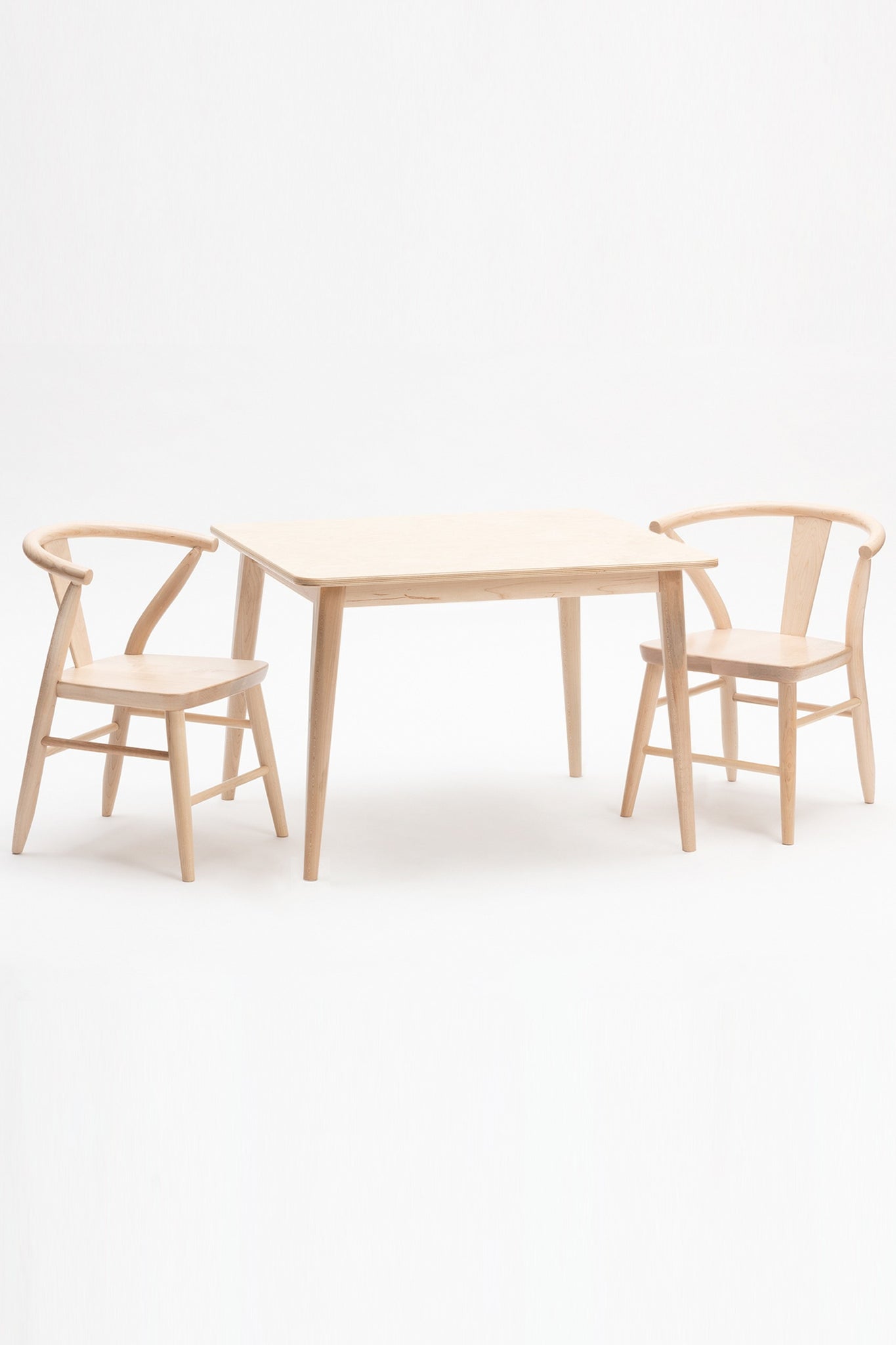 Milton and Goose Crescent Children's table and chairs in natural wood finish.  Made with sustainable materials and non-toxic finishes.