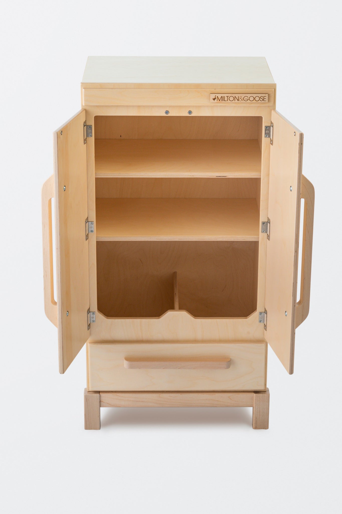 Milton and Goose wood play refrigerator in natural wood tone. Made with sustainable wood and non-toxic finishes. Fridge doors are open to see the interior toy storage.