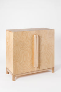 Milton & Goose cabinet in natural wood. 