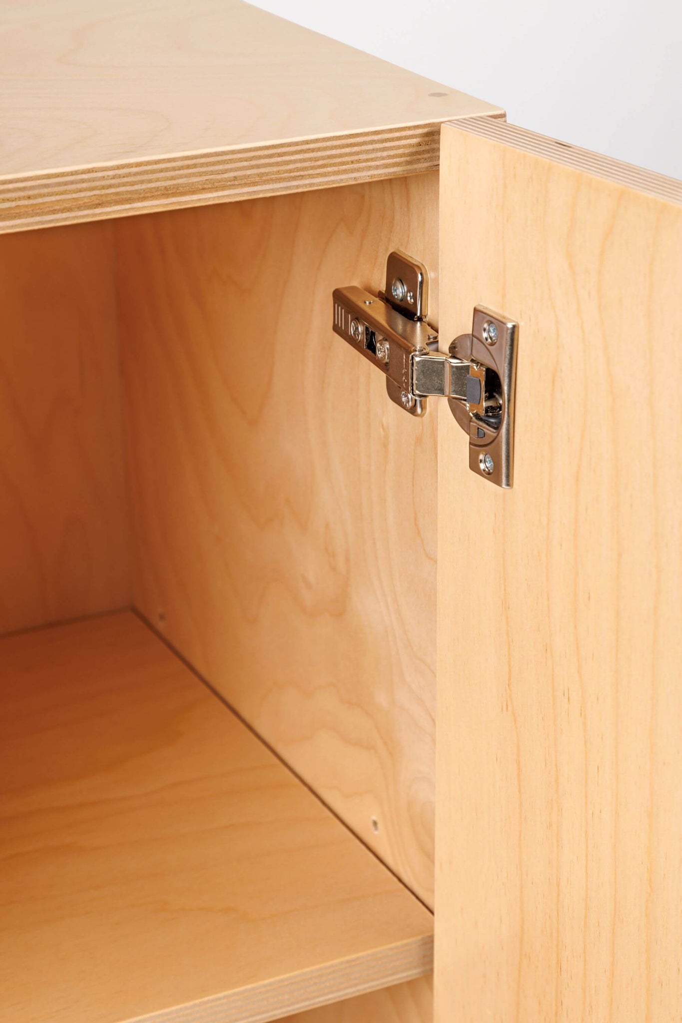 Close up of the soft close hinges inside the Milton & Goose Cabinet.