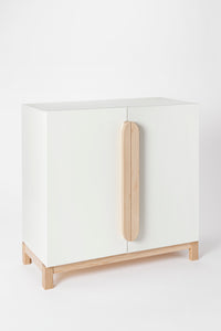 Milton & Goose wooden cabinet in white with two doors.
